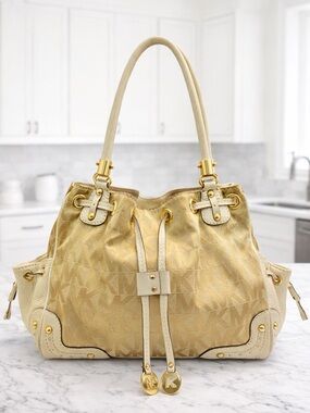 Michael Kors MK Monogram Drawstring Shoulder Bag Gold Jacquard Leather Trim